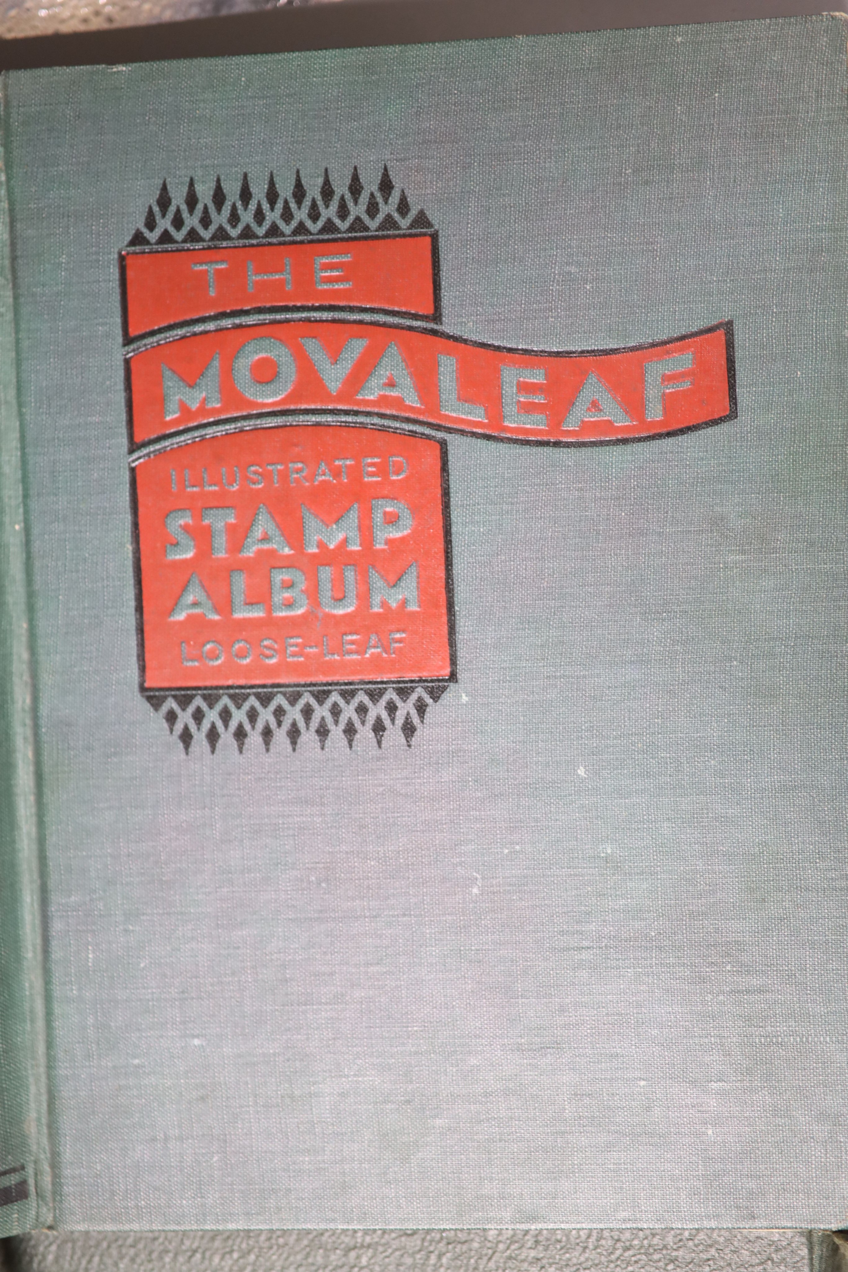 Four stamp albums and a small case containing loose stamps